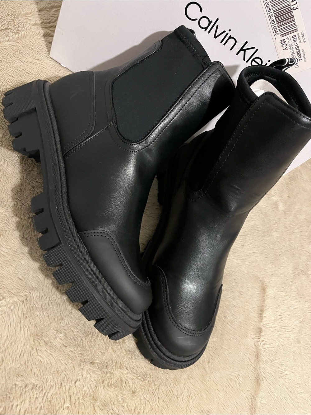 Calvin Klein Women's Remola Lug
Sole Chelsea Booties